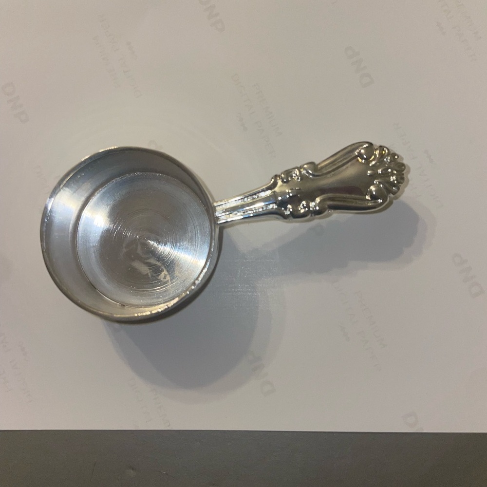 Elegance brand silver plated coffee measure